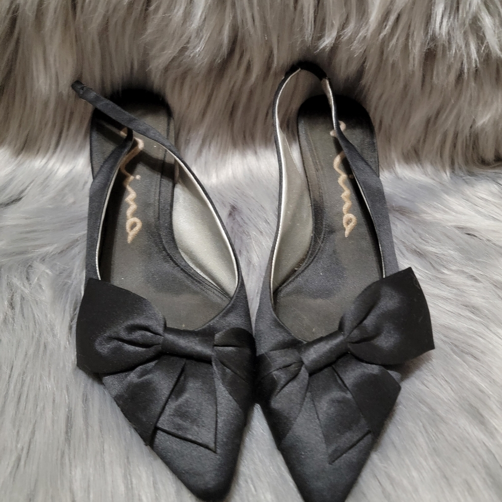 Worn Black Bow Heels